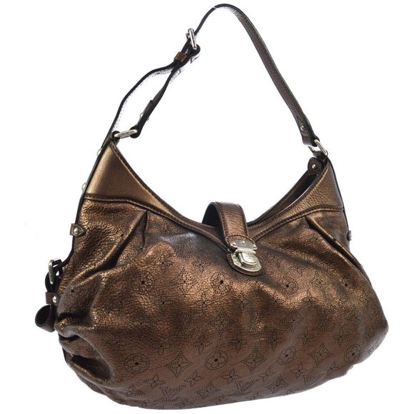 LOUIS VUITTON XS MORDRE MONOGRAM MAHINA - Picture 2 of 15